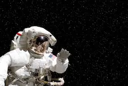 AI image tag example: an astronaut waving in outer space.